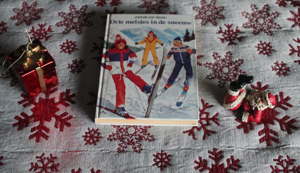 Drie meisjes in de sneeuw